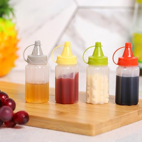 4 Pcs Mini Squeeze Condiment Bottles 1 OZ transparent for Easy Refill Kitchen Storage