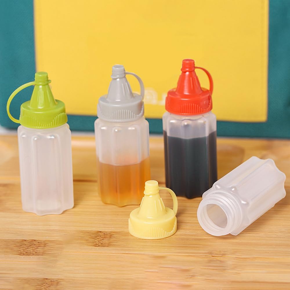 4 Pcs Mini Squeeze Condiment Bottles 1 OZ transparent for Easy Refill Kitchen Storage